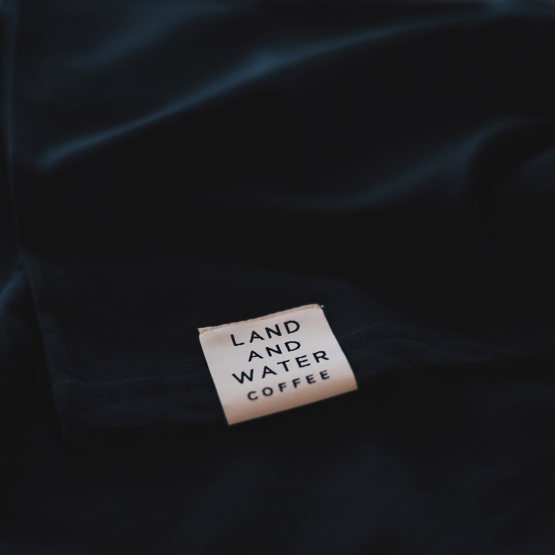 Land and Water Icon Tee - Dark Coal
